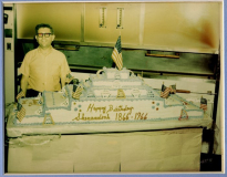 Emanuel (Mendel) Harris with Harris Bakery Cake