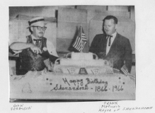 Shenandoah Centennial Cake with John Ferguson and Frank Matunis (Mayor of Shenandoah)