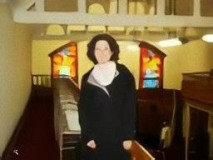 Unknown woman inside Kehillath Israel Synagogue